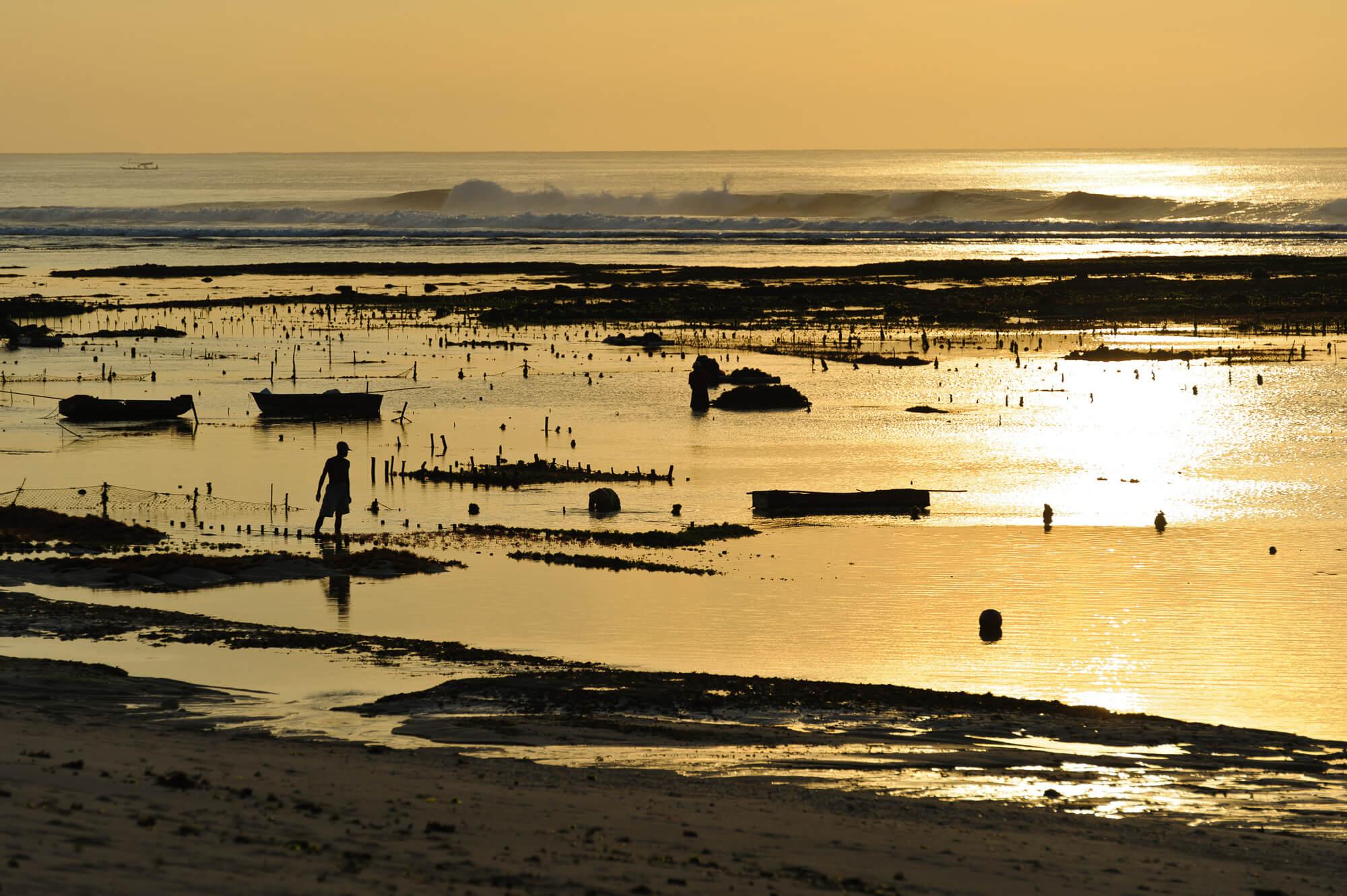 Bali's beautiful sunsets are a cause for casual celebration among visitors