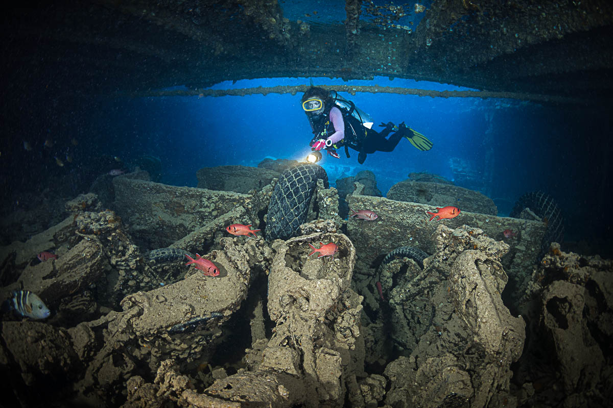 A diver exploring the Thistlegorm wreck.