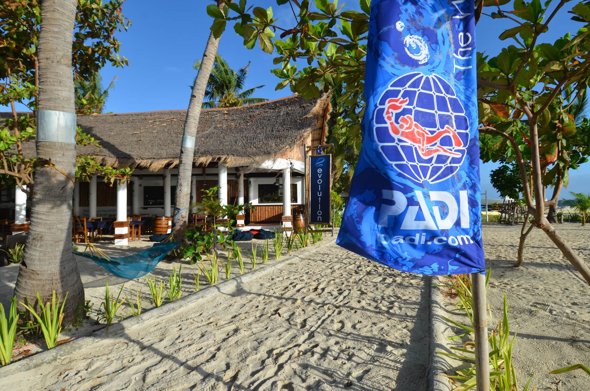 Evolution Resort and PADI flag